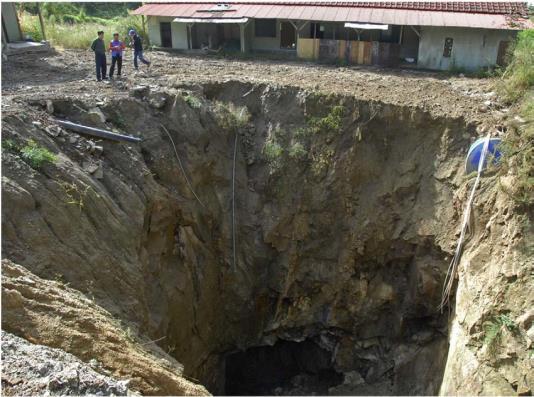 The open collapse hole over Mookeuk gold mine, S. Korea, 2009.